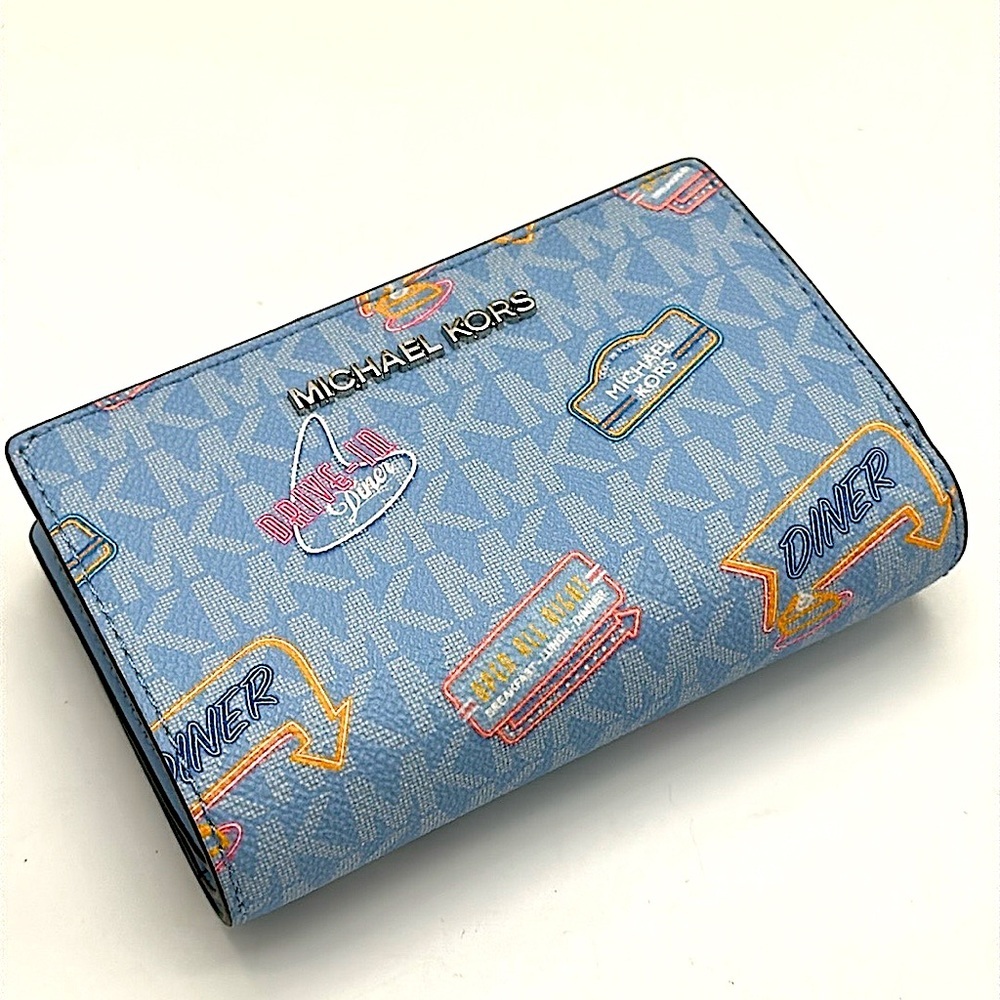 Michael Kors Jet Set Travel Medium Printed Signature Logo Bi-Fold Wallet
LT SKY - Picture 9 of 16